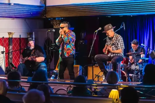 Blues band performing on deck during Blues Cruise 2026
