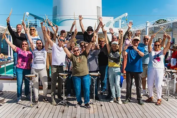 Guests enjoying a music workshop on deck